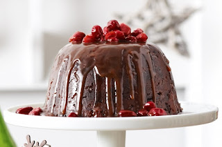 Christmas pudding with cranberry toffee sauce Recipe