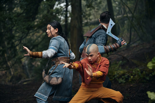 Gordon Cormier as Aang with Kiawentiio as Katara and Ian Ousley as Sokka in Battle Position in 'Avatar The Last Airbender'
