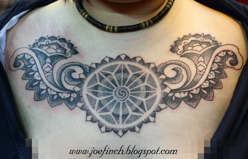 Dot work Mandala chest piece tattoo
