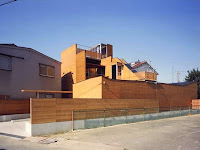 Japanese Wood-Clad House Design With Multi-Level Decks