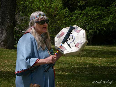 woman with handheld drum