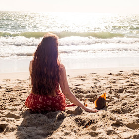 Kelsi Rutledge on beach with guitarfish