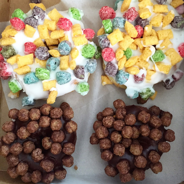 Fruity Pebbles and Cocoa Crisp Doughnuts from Voodoo Doughnuts