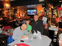 Larry signing the first book of the evening