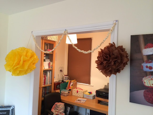 tissue pompoms and popcorn garland