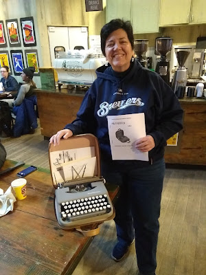 Reporter Meg Jones with Skyriter typewriter