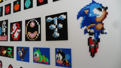 Pixel art made out of perler beads. Close up of sonic 