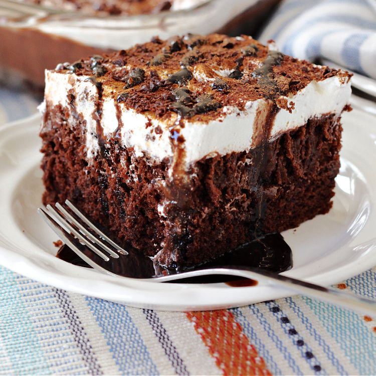 A piece of Easy Mexican Hot Chocolate Poke Cake
