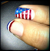 Oh, and I almost forgothere is a photo of my July 4th Nails.