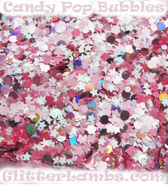 Our "Candy Pop Bubbles" loose glitter mix has big pink holographic dots, light pink stars, light pink butterflies, pink spades, pink daisies, white stars, and light pink dots.