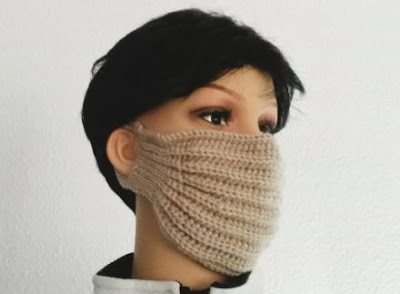 Декоративная вязаная маска для лица Decorative knitted face mask