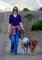 Cooper Jacob hiking with two dogs