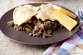 Ground beef and sautéed turnips topped with pie crust and baked in a skillet. Hearty comfort food from the farm share.