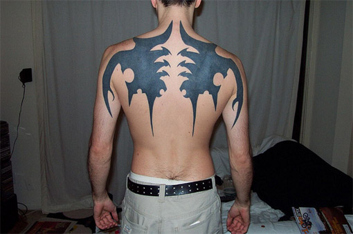 The Back Tattoo Picture is courtesy of David Schexnaydre The Tribal Wings 