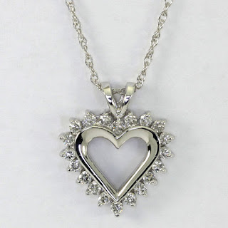 http://www.ebay.com/itm/Diamond-heart-pendant-14K-white-gold-round-brilliants-70CT-open-sweet-1-long-/121805356360?hash=item1c5c2a3d48