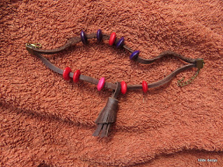 LoveLea's leather double bracelet with wooden beads  and leather tassel.