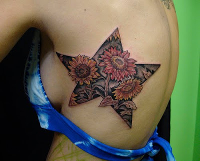 pretty sunflower tattoo star designs for girls on upper shoulders