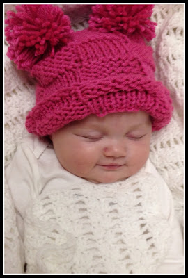 Baby with Pink Pom Pom Hat