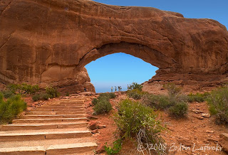 Click for Larger Image of People Under Arch