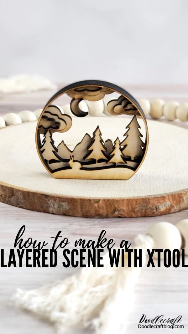 How to Make a Layered Scene with xTool  Learn how to make a layered scene using a laser cutting machine.    I am having so much fun using my new xTool laser cutter. It's easy to set up and can cut all sorts of materials.   Today I'm sharing these cute little snowglobe/window/layered scenes and how simple they are to create.