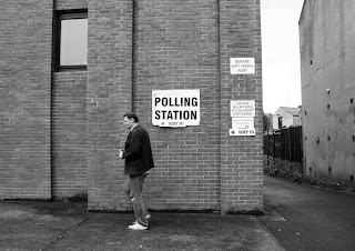 Man walking into Polling Station