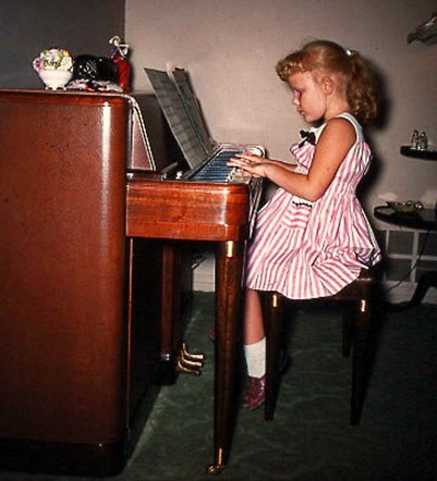 Judy at the piano 1950s_edited-1