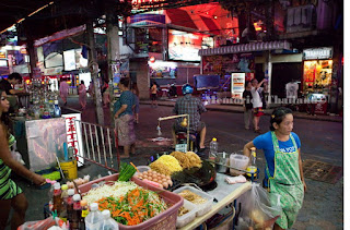 A small street stall with nice street food on the corner in Pattaya's Walking Street