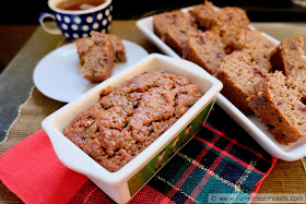 close up of a loaf of sweet fruit and nut bread powered by a pound of pork sausage
