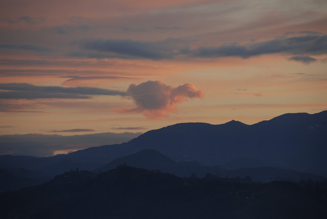 cloud formation with an apricot color sky