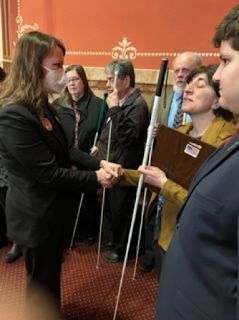 Senetor Jesse Danielson meeting with blind coloradans at the Day at the Capitol