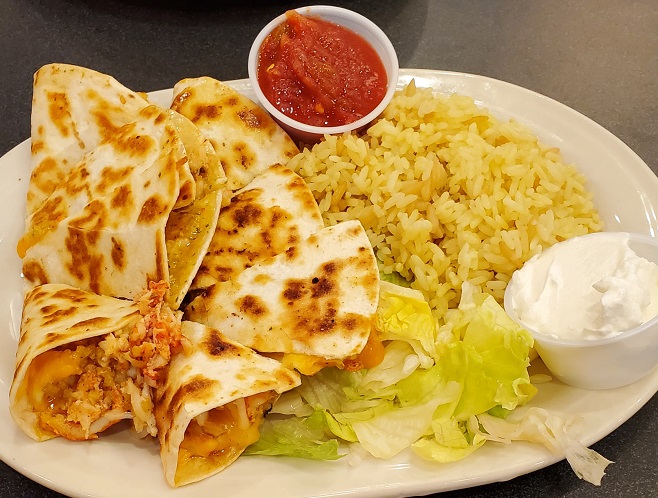 quesadilla with rice salsa and sour cream