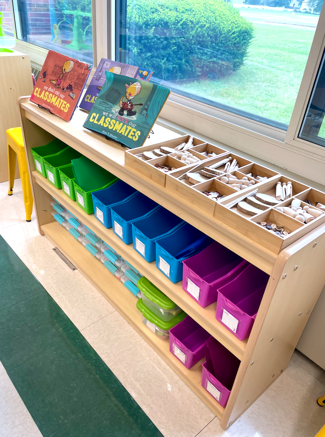 How I organized shared materials in my 1st grade classroom with color coded bins and pencil cases