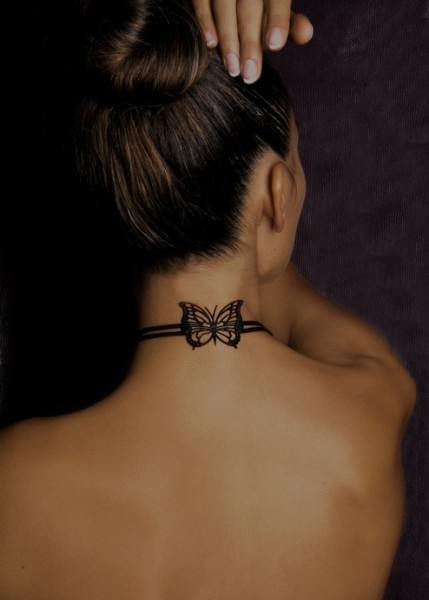 butterfly neck tattoo