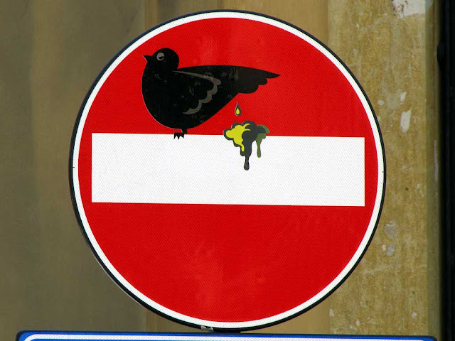 Clet Abraham, pigeon and its dejection on a no entry sign, via  del Porticciolo, Livorno