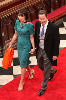 British Prime Minister David Cameron (r.) and wife Samantha Cameron arrive at Westminster Abbey.