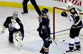 Ian Laperrier celebrates the first Avalanche goal