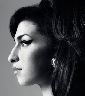 Woman with a protruding facial profile. Amy Winehouse, British musician.