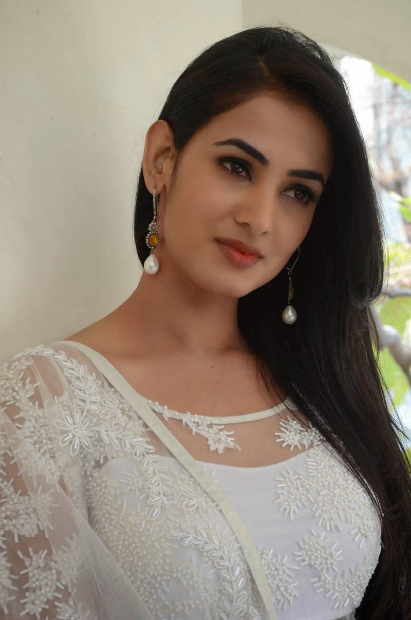 Sonal Chauhan Photos in White Salwar Kameez at Legend Success Tour ...