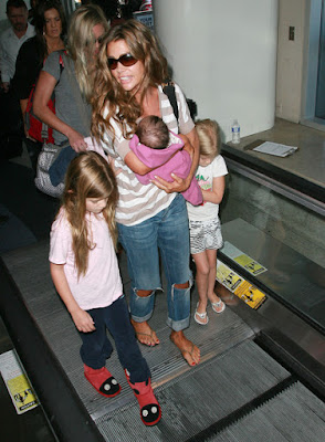 Denise Richards and with Her daughters Sam and Lola photos Arriving At LAX Airport