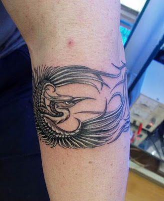 A cool phoenix tattoo design There is also a collection of phoenix tattoos