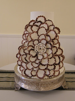 3-tier (extra deep) round buttercream with fondant flower