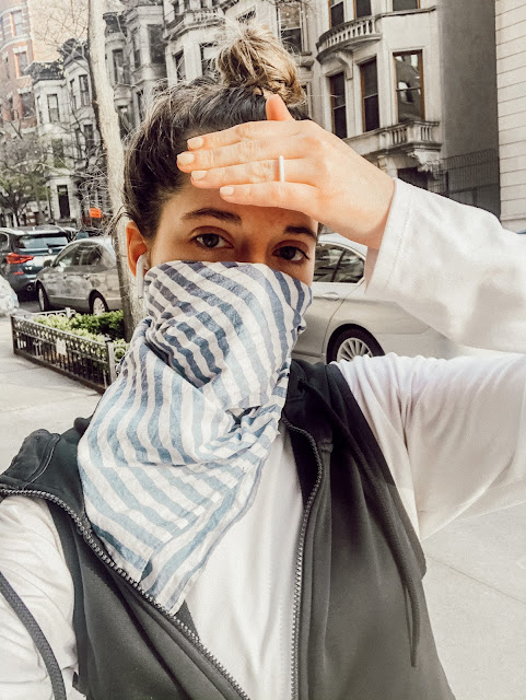 Nyc fashion blogger Kathleen Harper wearing a bandana face mask in NYC.