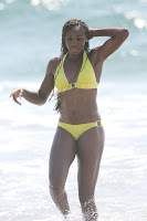 Venus shows off her hot body in yellow bikinis