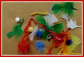 photo of: Feathers in Preschool for Thanksgiving Art Project via RainbowsWithinReach