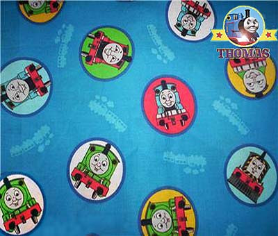 Cotton fabric featuring Thomas and friends on a blue background to cover a childs room Sodor table