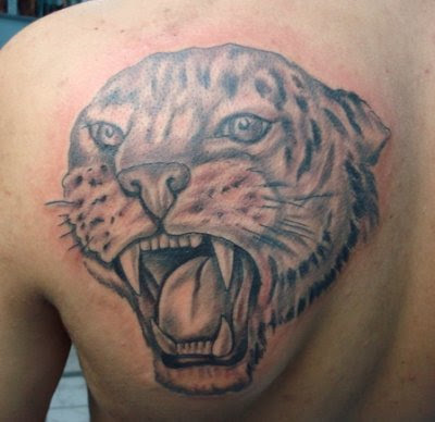 tribal tiger tattoos. Tiger Upper Back Tattoo