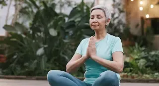 An old lady doing yoga