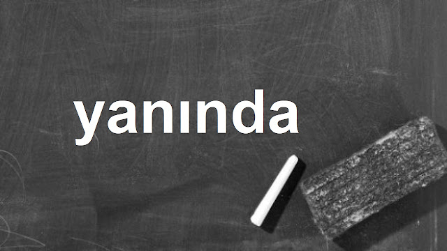 yanında