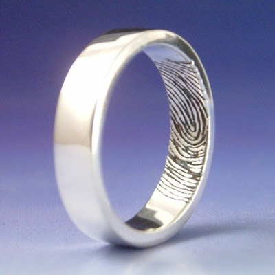 Fingerprint Wedding Band Another genius way to incorporate your fingerprint