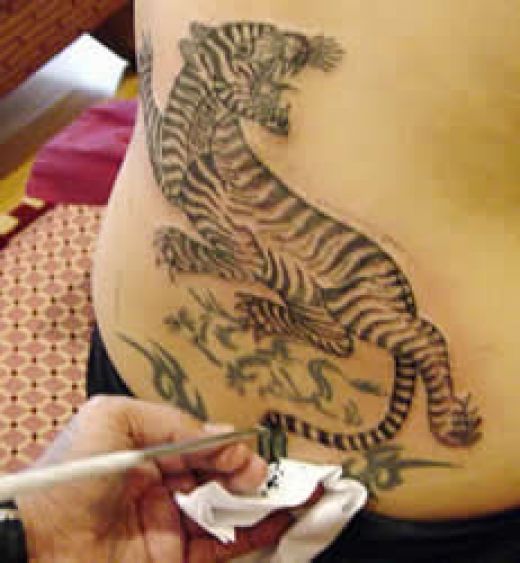 Always loves a lower back tattoo one of the best tiger tattoos